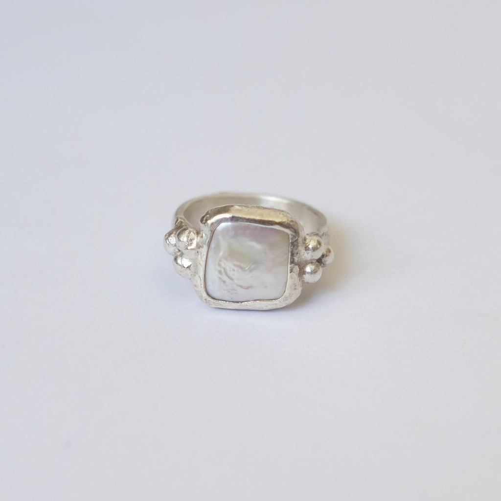 Her Pearl Ring