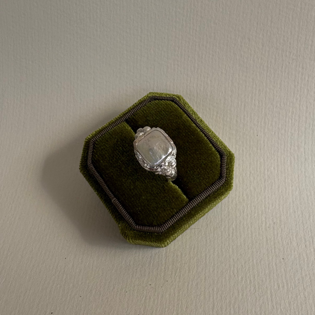 Her Pearl Ring