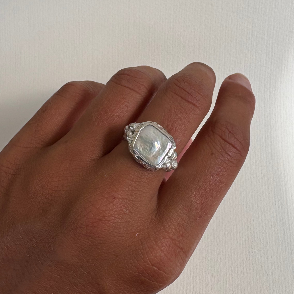 Her Pearl Ring